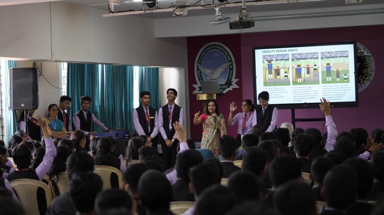 Students at a college awareness assembly run by Urjas in Bengaluru